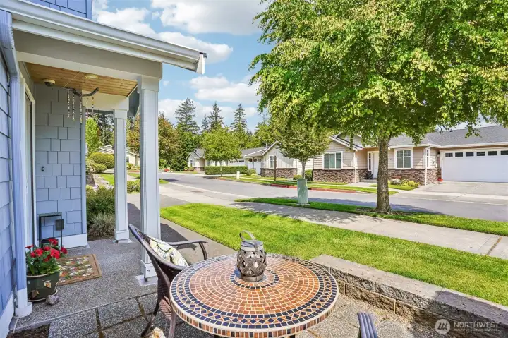 Sunny front patio for outdoor coffee, dinner or refreshments. Sunny front patio for outdoor coffee, dinner or refreshments.