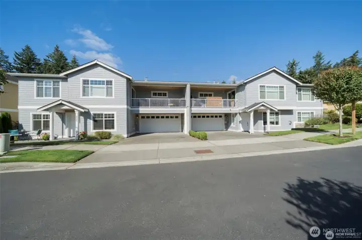Lower left corner is condo with 2 car garage. Lower left corner is condo with 2 car garage.