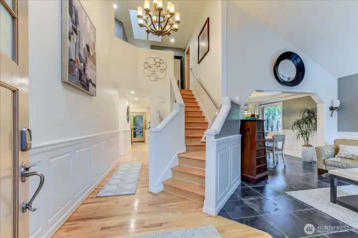 Spacious foyer entry leading into the open-concept living room.