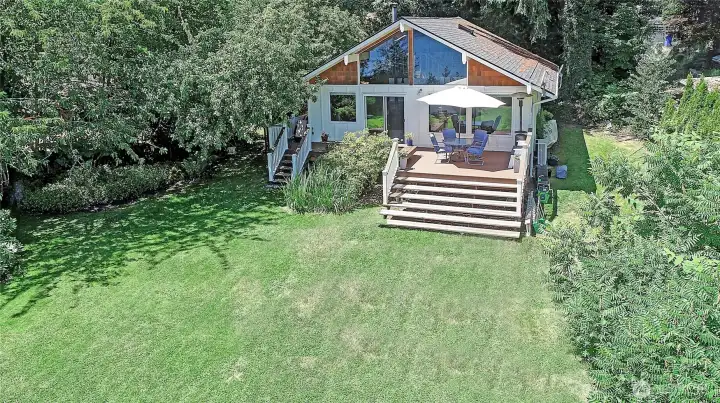 Rare opportunity to own 105' of no bank lakefront in the coveted Lake Kathleen community