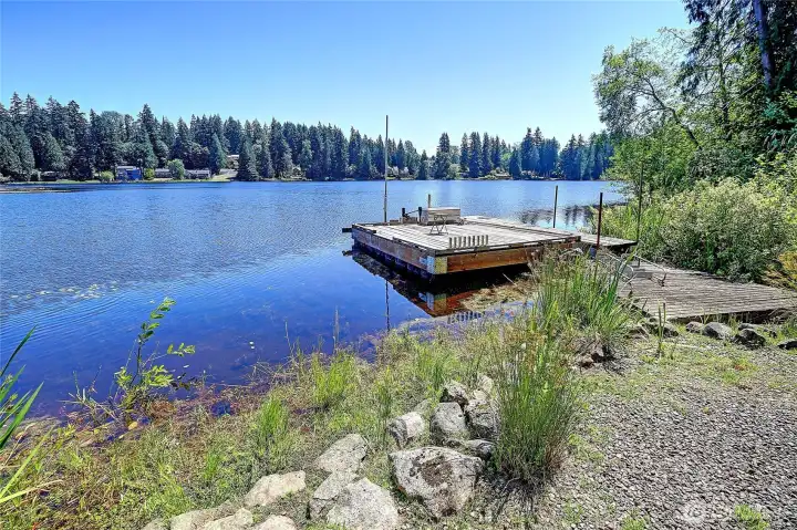 Double lot on the lake gives you 105' of shoreline to enjoy. Floating dock is included, floating barge is not included).