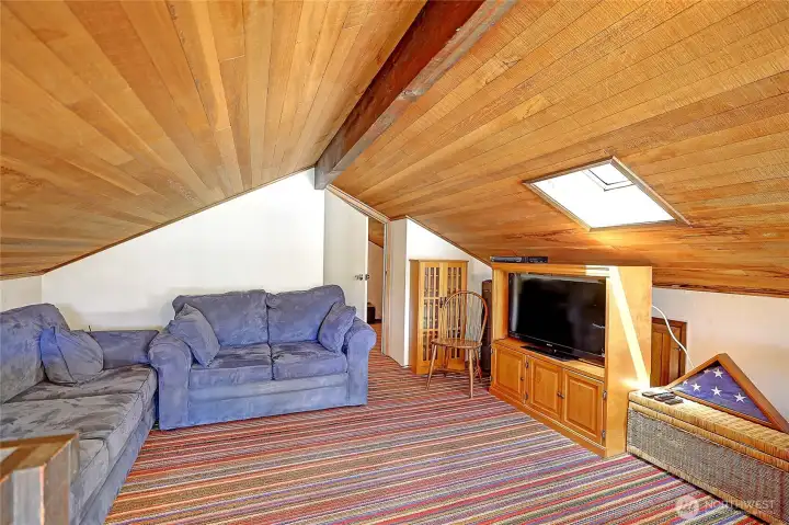 Spacious loft with an extra room gives you additional living space for guests.
