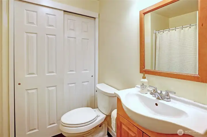 Guest bathroom is located just off the guest bedroom