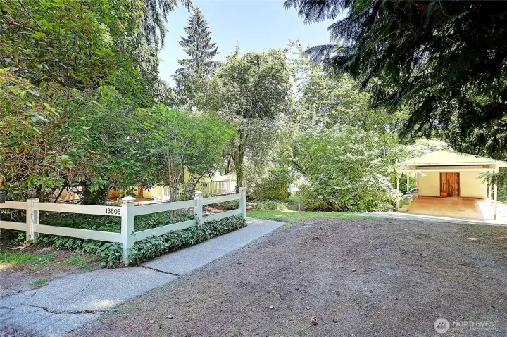 Plenty of parking in your driveway leading to the carport.