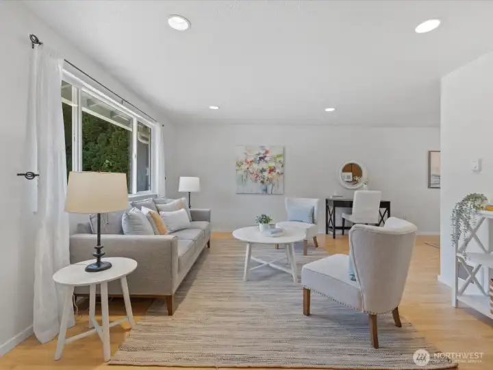 Easy care laminate floors run through the main living areas.