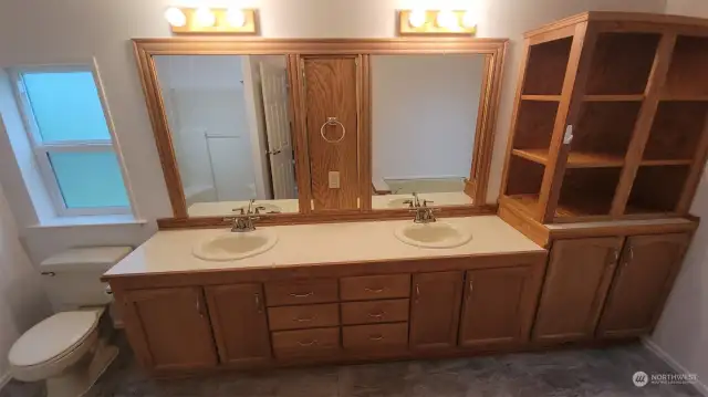 Great double sinks in the bath off primary bedroom.