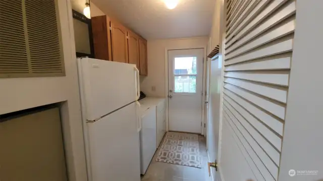 2nd fridge in the utility room. With door to the outside.