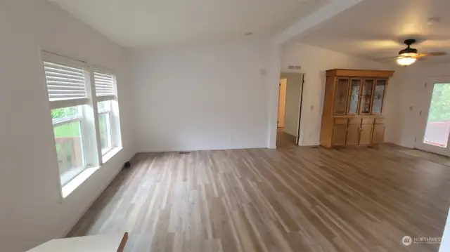 Large living room. Great new flooring throughout the home.