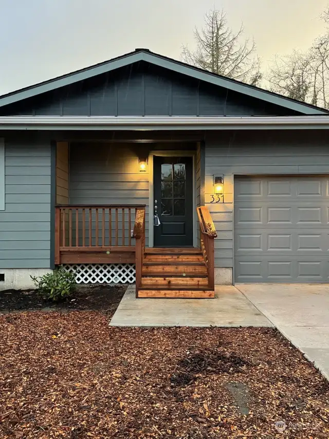 Front of home with parking pad