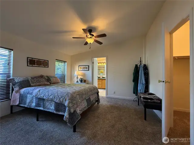 Primary bedroom includes a walk-in closet and full ensuite