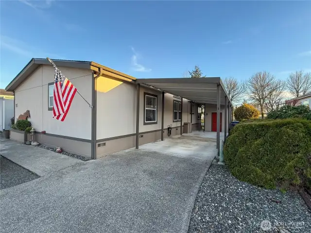 Parking fit for two cars in this carport!