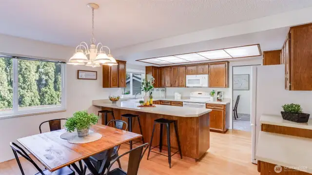 Kitchen is thoughtfully placed between both dining space, allowing endless dining and entertaining options.