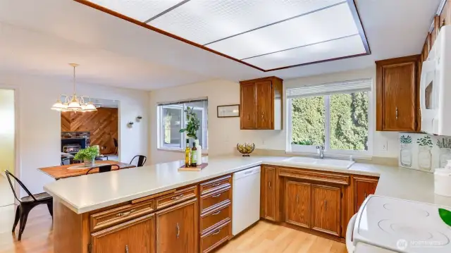 The spacious and open kitchen is just steps from the formal dining room, ideal for easy serving.