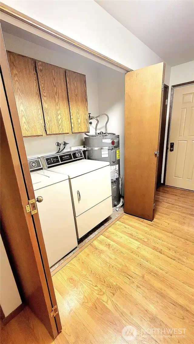 Inside unit laundry room  with washer and dryer inlcuded.