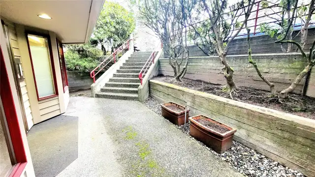 Exterior landing next to main entry.