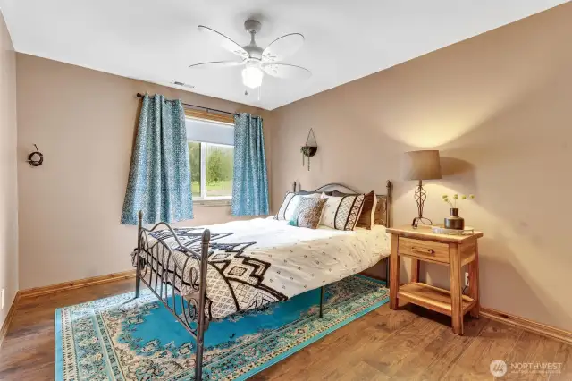 2nd Floor bedroom #2, lovely wood flooring. Bedroom faces the front of the property.