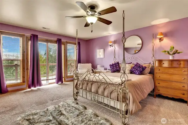 Primary Bedroom faces back of property with stunning Mt. Rainier views.