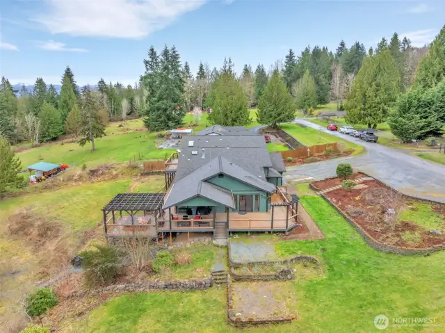 The previous owners had a above ground swimming pool on the flat area in this photo.