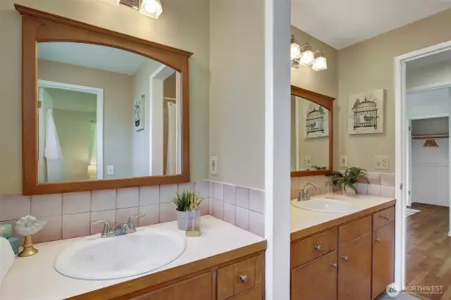 Another view, with the toilet and door behind you, and the door to the main hallway at the far end. Great spaces! Everyone can have their own drawer in the bathroom :)