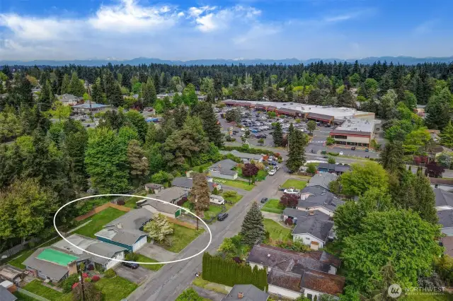 Walkable to the shops! At the end of the block is a crosswalk, over to the QFC, Starbucks, taco restaurant, etc.