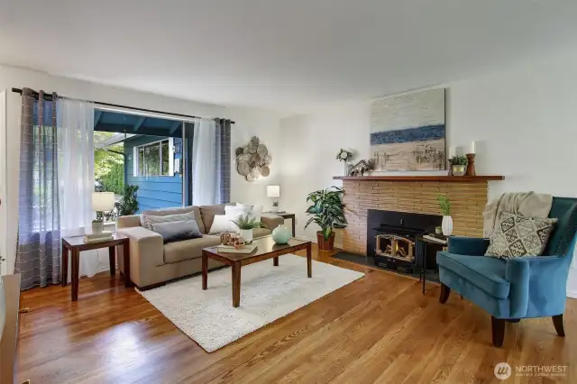 Mid-century brick fireplace is lovely, creating a warm look in the room, year round.
