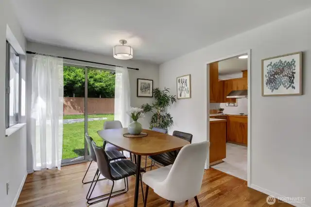 Good sized dining space for everyday use. If you're having a big group over, you could extend your table as far into the Living room as you need! Very flexible.