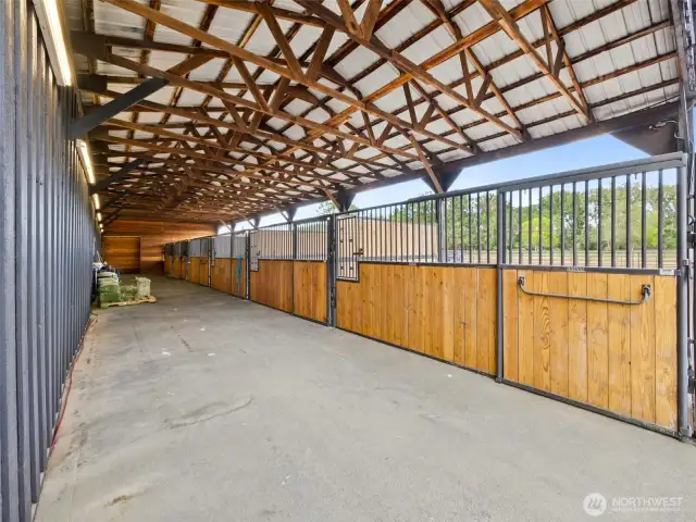 2,125 sq ft stable with pipe fenced turnouts