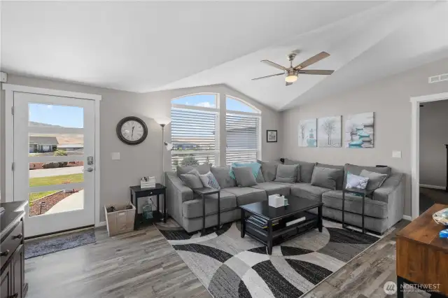 Family room with new flooring throughout.