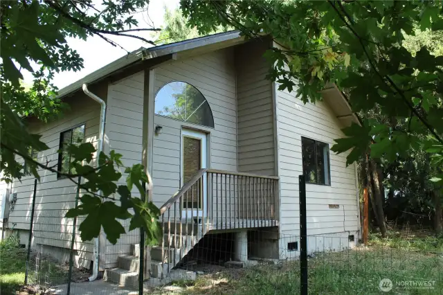 Arched window in the back