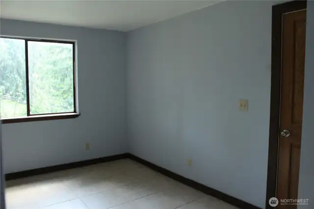 Primary bedroom at back of home