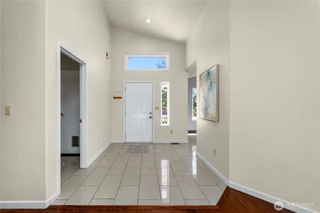 Looking back toward the entry, laundry room and garage access on the left.