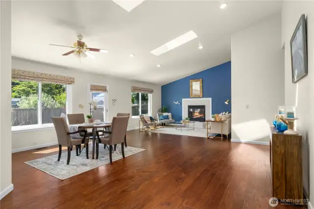 Spacious Dining and Living.  Light, bright and open with vaulted ceiling, skylights and abundant windows
