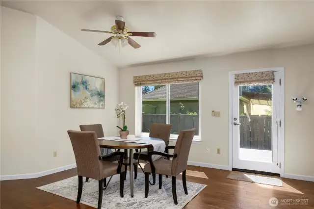 Dining room door leads to brand new deck and back yard