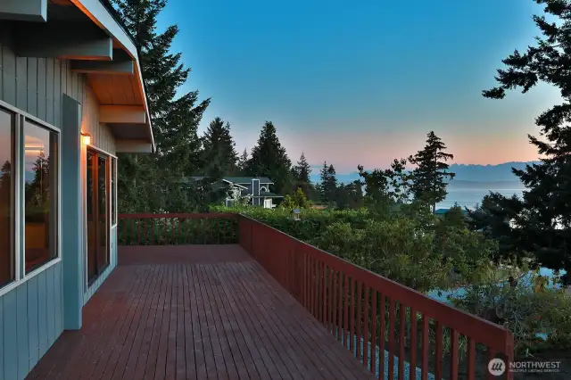 Invite your family & friends! Plenty of space to entertain. Expand your living to the expansive decks that surround the south, west and northern sides of your home. The surrounding landscape provides privacy here.