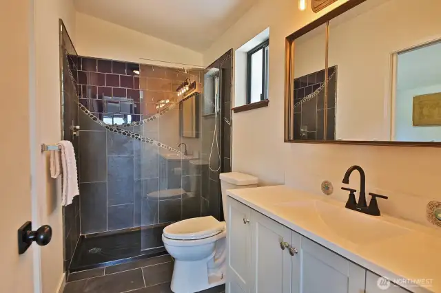 Updated Primary Bath with custom tile in the shower!