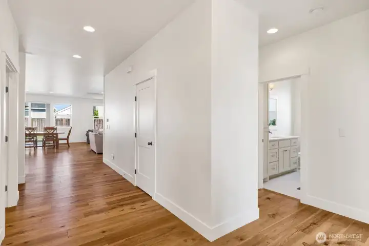 We love the extra-wide main hallway—it creates an open, inviting flow throughout the home!