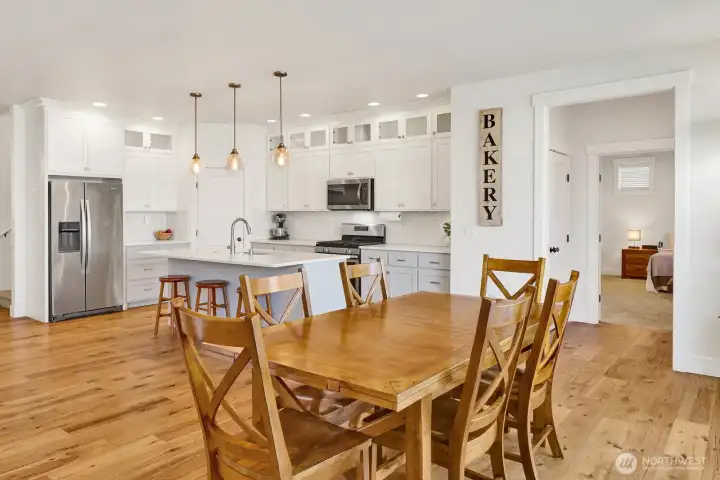 Spacious dining area with room to grow—perfect for hosting Thanksgiving and all your family gatherings!