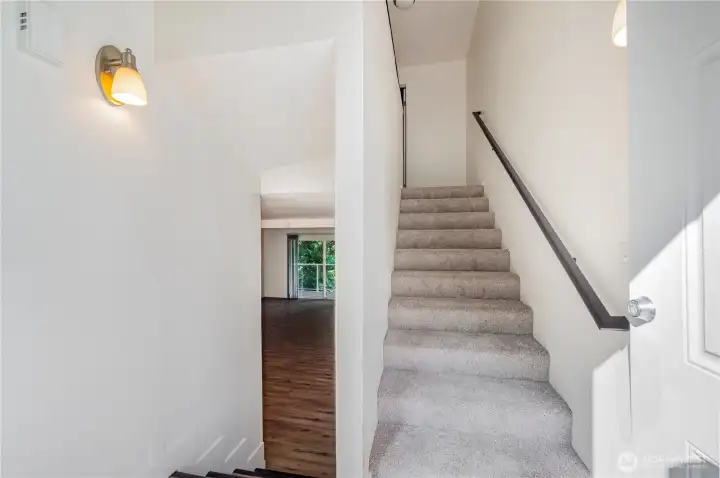 Split level entry with bedroom upstairs and main living downstairs.