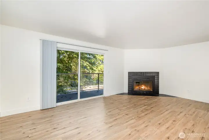 This multi-level gem welcomes you with a cozy fireplace in the living room, a delightful dining area with new flooring throughout.