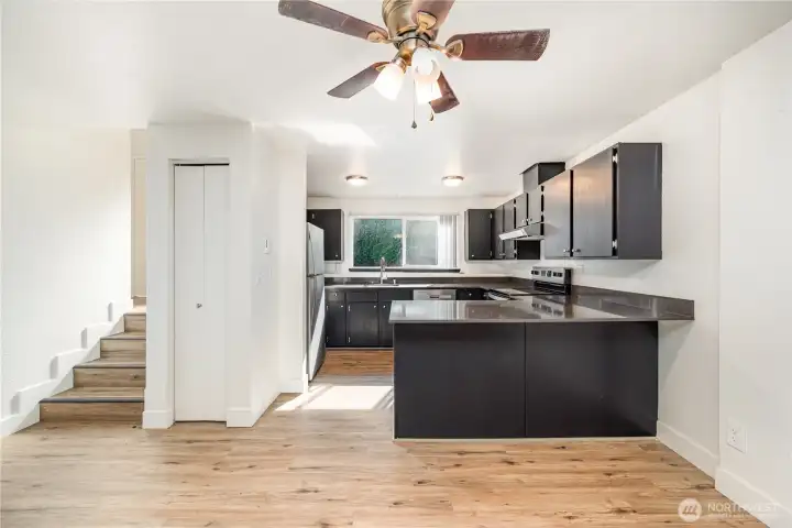 This space brings in an abundance of natural light. Ceiling fan offers year around comfort.