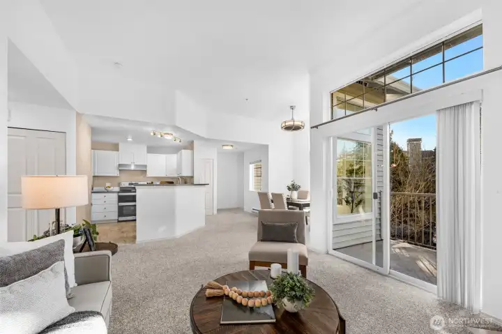 Large windows welcome bright, natural light