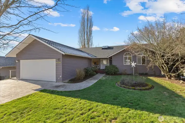 Wood siding, a 50 year roof, Tankless Water Heater & Two Gas Fireplaces! Welcome Home!