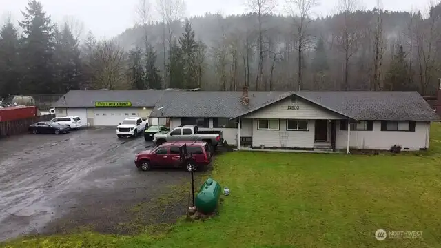 Enjoy waterfront living on a large lot and run your home business.