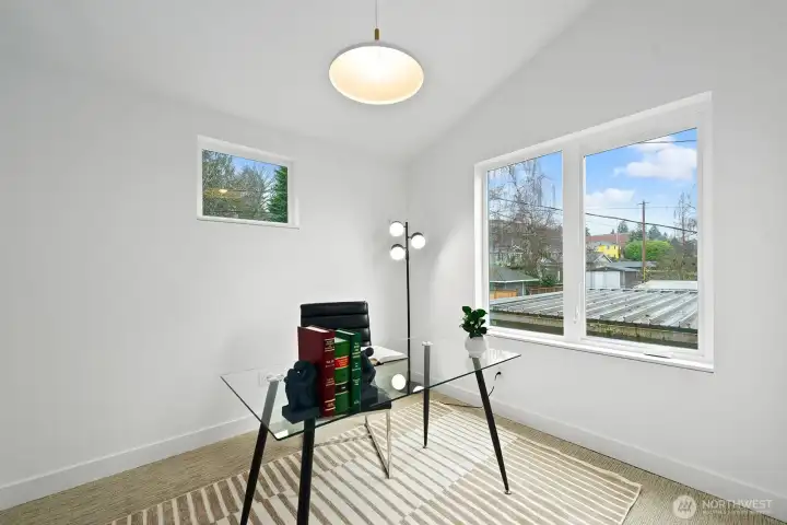 Upstairs office, den, or nursery.