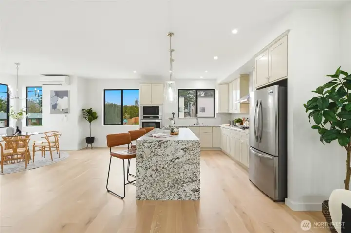 Light and bright modern kitchen with contemporary lighting and appliances