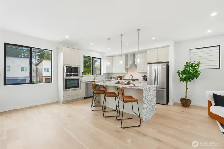 Light and bright modern kitchen with contemporary lighting and appliances
