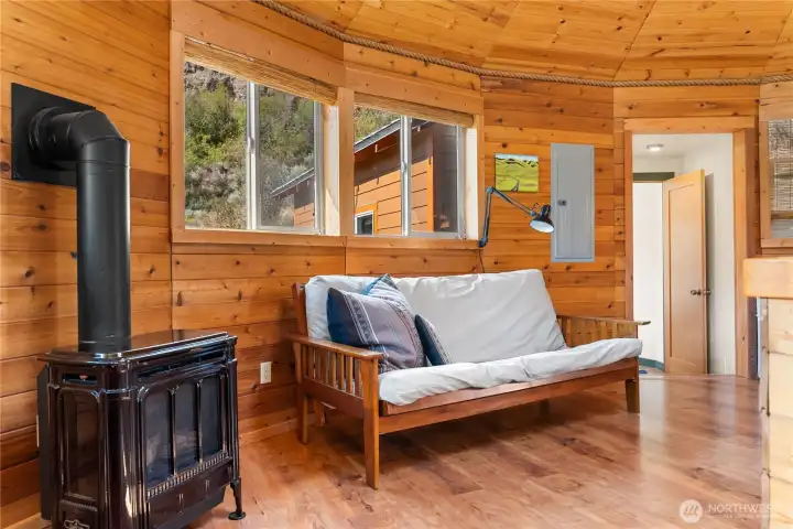 A propane stove provides heat and a focal point for gatherings.