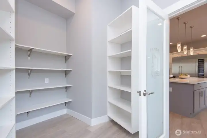 Big Walk-In Pantry with Sink & Prep Space.