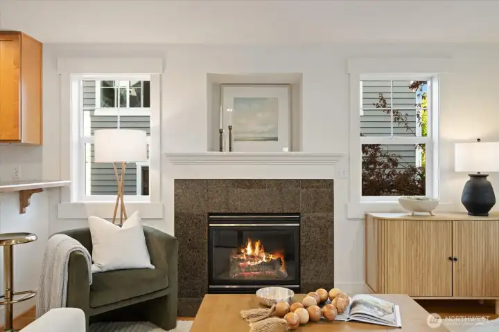 Cozy up on rainy Seattle days by the elegant gas fireplace, the warm and inviting centerpiece of the main living area.