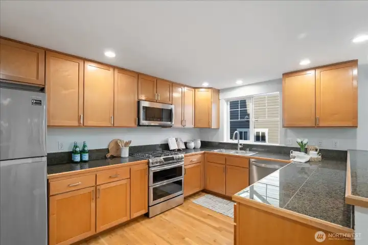 This well-equipped kitchen offers stainless steel appliances and abundant prep and storage space for effortless everyday cooking.